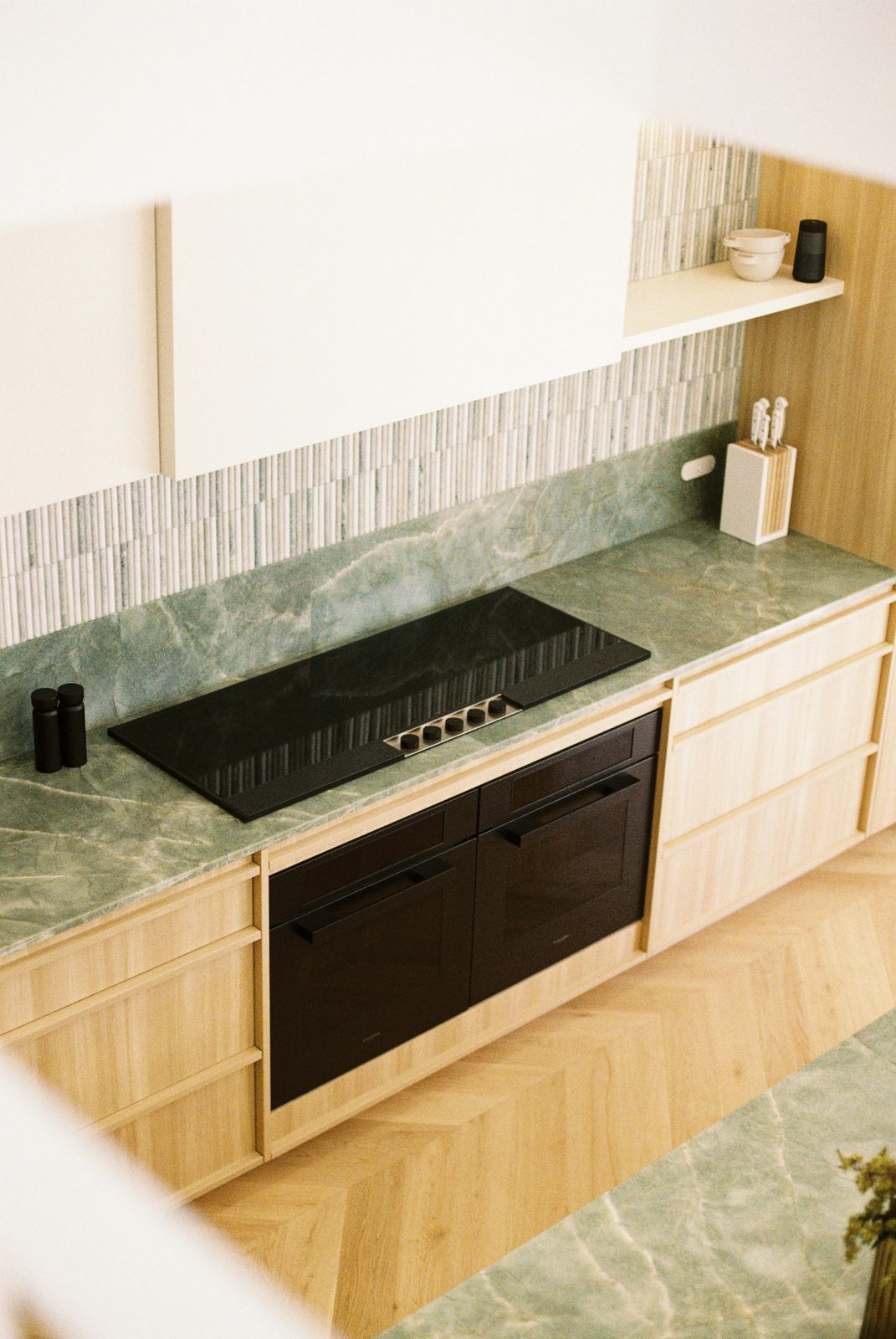 Clean, finished kitchen with timber cabinetry after a renovation